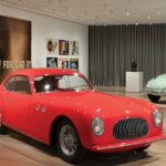 berlinette Cisitalia 202 GT rouge exposee au musee pour les voitures au MoMA